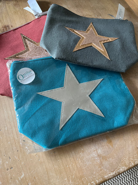 Makeup bag with metallic star
