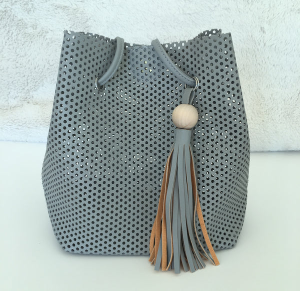 Perforated bucket bag