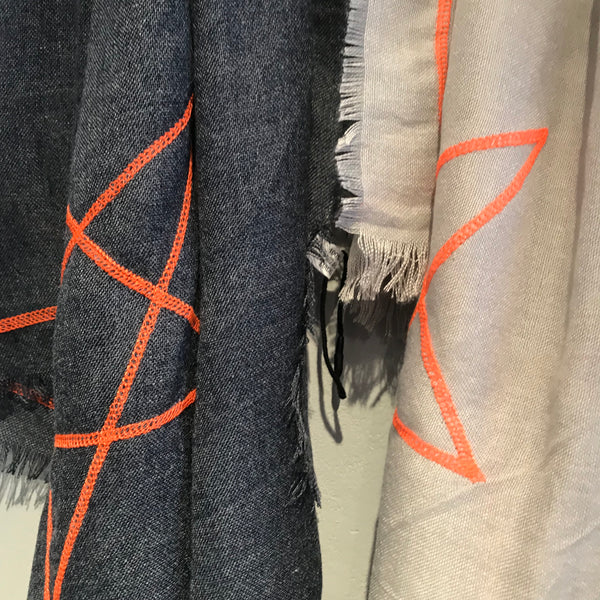 Dark denim blue with orange star