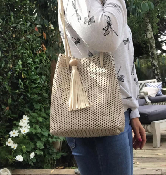 Perforated bucket bag