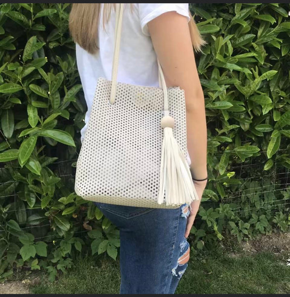 Perforated bucket bag