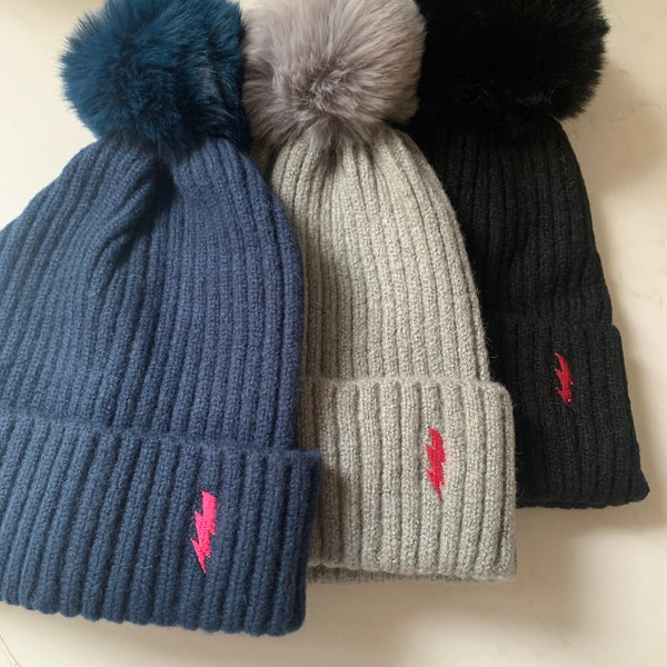 Soft pom pom hats - embroidered lightning bolt