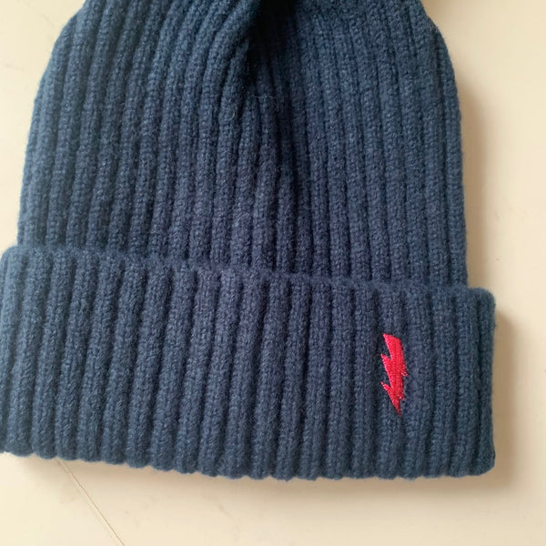 Soft pom pom hats - embroidered lightning bolt