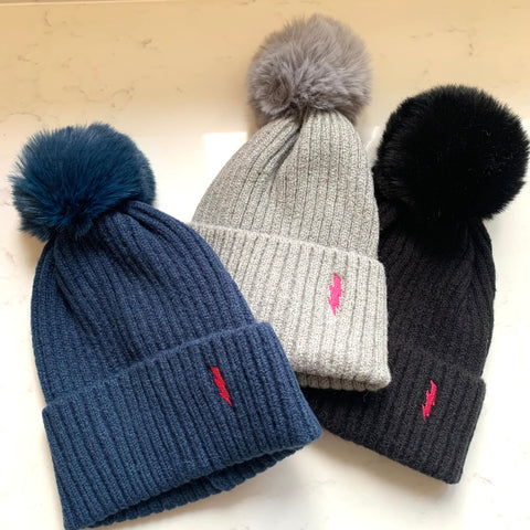 Soft pom pom hats - embroidered lightning bolt